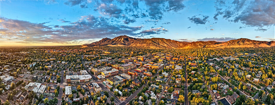 Panorama sunrise drone view of Boulder Colorado showing Pearl Street and CU Boulder