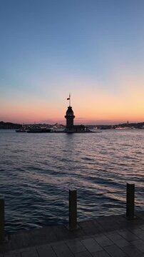 Vertical video of Maiden's Tower overlooking the Bosphorus in &Uuml;sk&uuml;dar, Istanbul, Turkey, ideal for travel, tourism, Istanbul cityscape, historic landmarks, and destination content. Kız Kulesi view