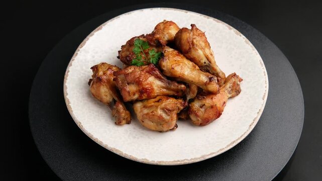 Air Fryer grilled chicken wings (drummet) on white plate