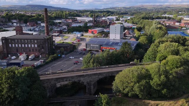 Aerial Video of Historic Stone Viaduct, Cotton Mill and River Irwell