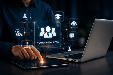 Fototapeta premium Manager selecting human resources module on tablet screen connected to laptop, managing employee profiles, team structure, recruitment, education, and corporate organizational chart system digital