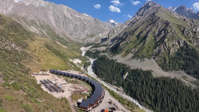 Aerial view of the resort buildings nestled in the mountain valley of Ala Archa National Park in Bishkek, Chuy Region, Kyrgyzstan.