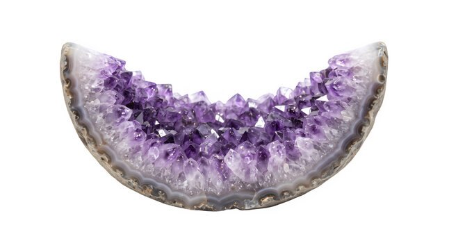 A beautiful crescent shaped purple amethyst crystal geode slice isolated on transparent background