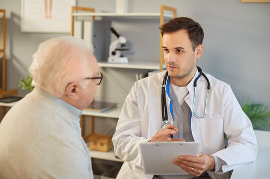 Senior nursing, health and social care of elderly people, young doctor, male geriatric nurse helping, checking during exam, healthcare hospital system, professional physical with patient in clinic