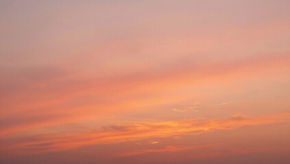 Fototapeta premium Serene sunset sky with soft pink and orange hues during twilight 