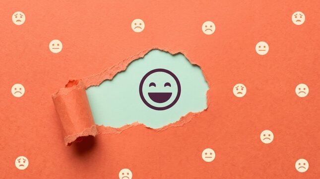 Smiling face revealed through torn paper with sad emojis background