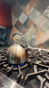 A tea kettle whistling
