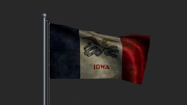 The Iowa state flag on a pole with time-worn fabric in continuous motion