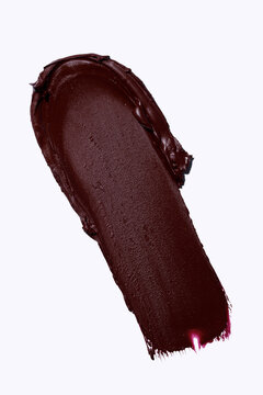 dark red burgundy plum lipstick smear, cosmetics beauty product texture, liquid blush, matte lip gloss swatch