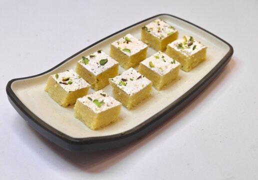 Barfi beautifully served on a white plate