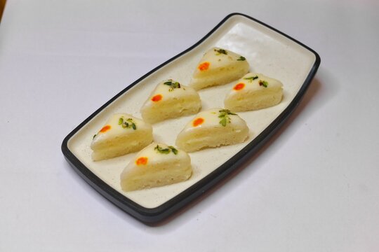 Malai sandwich or malai cham cham beautifully plated on white plate