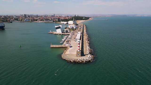 Aerial View of Burgas Lighthouse, Port Breakwater, Marina, and City Skylinev