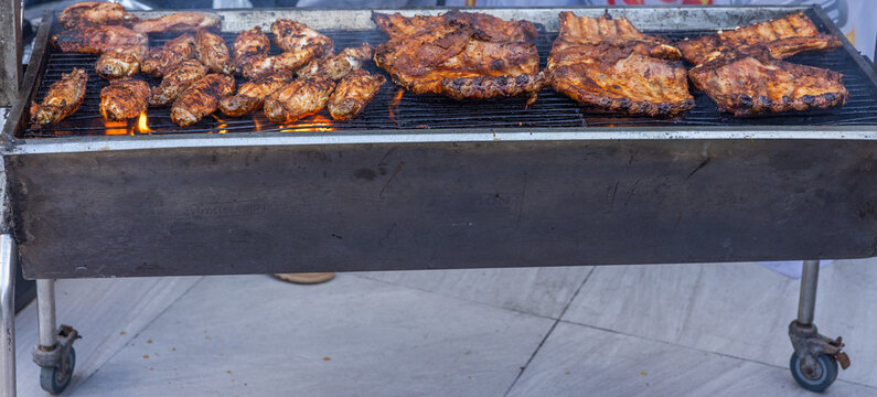 Close-up of meat on barbecue grill