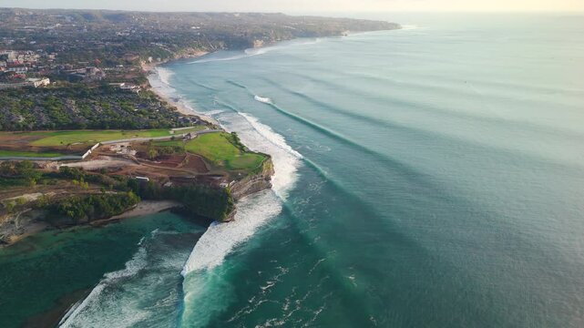 Aerial view of landscape with ideal ocean waves. Surfing paradise