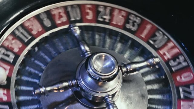 Close up View of an Elegant Casino Roulette Wheel Spinning with Ball