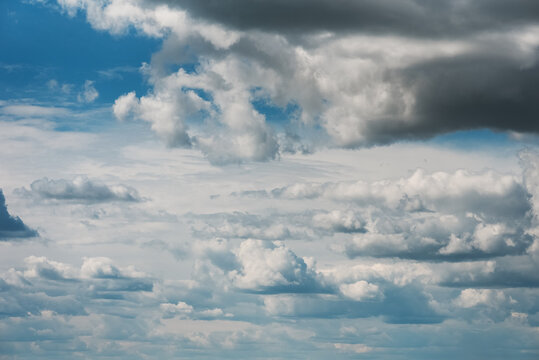Beautiful cumulus clouds in the blue sky
