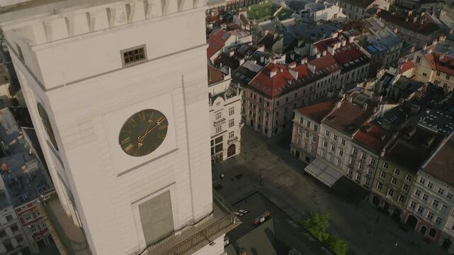 Aerial View of Lviv City Hall Clock and Rynok Square
Close aerial perspective of the Lviv City Hall clock tower overlooking the historic architecture of Rynok Square.