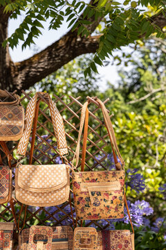 artisanal leather goods sold at an outdoor street market in europe