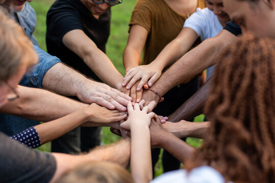 Unity through diverse hands together.