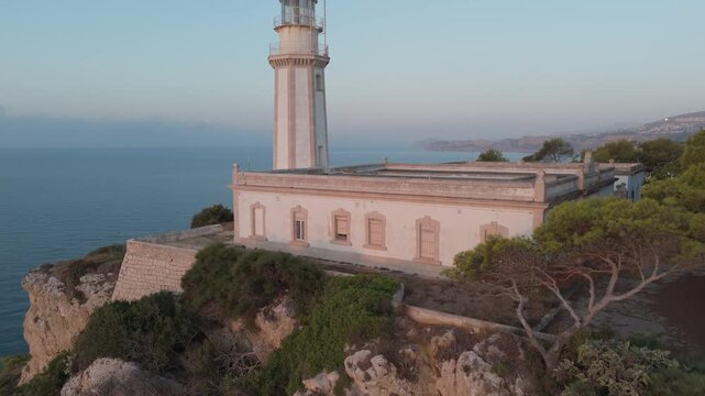 Scenic la nao lighthouse overlooking the mediterranean sea in javea