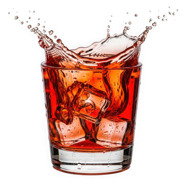 Red cocktail splash in glass with ice cubes isolated on white background