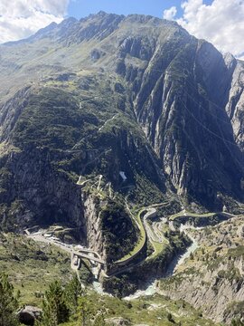Panoramic view of winding mountain roads and alpine gorge near Andermatt, Switzerland