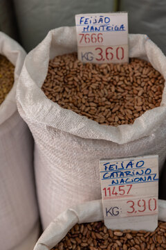dried beans for sale in bulk at neighborhood grocery store in Lisbon, Portugal