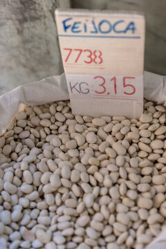 dried beans for sale in bulk at neighborhood grocery store in Lisbon, Portugal