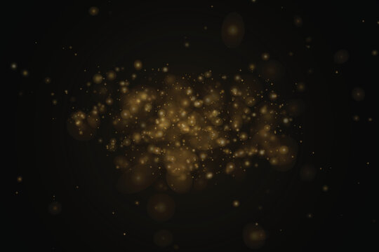 Soft golden bokeh light particles glowing on a dark background, ideal for luxury advertising, festive banners, holiday cards, presentations and elegant event designs.