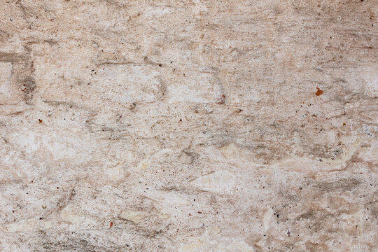 Rough beige plaster wall texture background