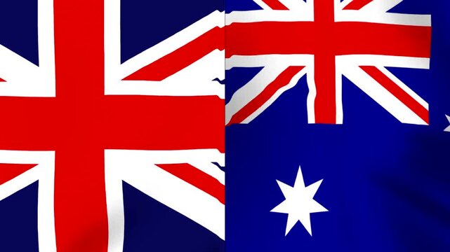 The national flags of the united kingdom and australia side by side fluttering in the wind