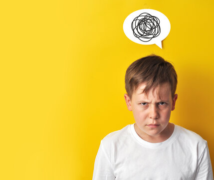 Angry Boy with a Symbol of Confused Thoughts