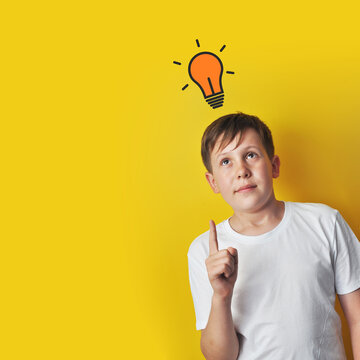 Boy with Light Bulb Idea Symbol