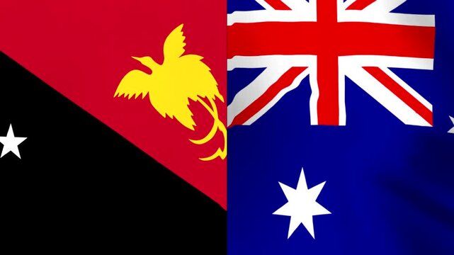 Waving national flags of Papua New Guinea and Australia side by side