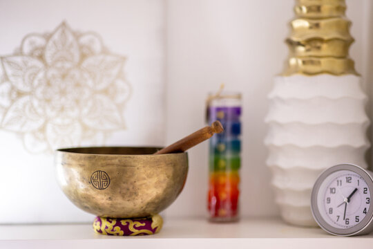 Meditation corner with singing bowl and chakra candle