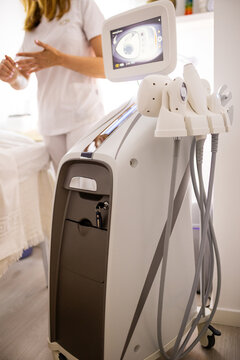 Advanced body shaping machine in aesthetic treatment room
