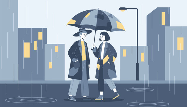 Young couple in warm coats walks together under a large umbrella on a rainy day in a modern metropolitan city.