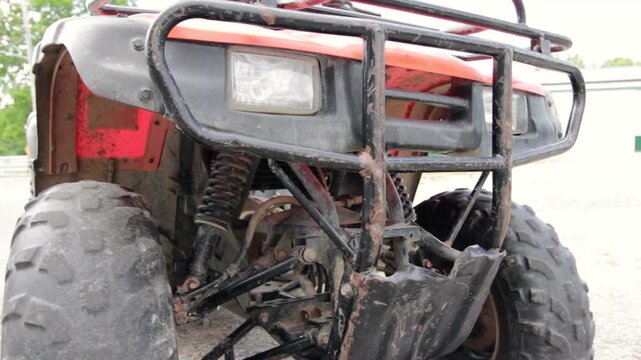Front of muddy four wheeler
