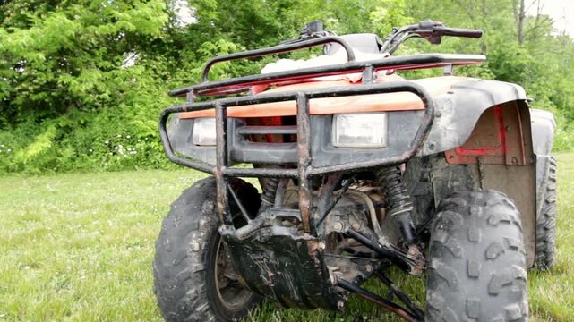 Muddy four wheeler steadycam shot
