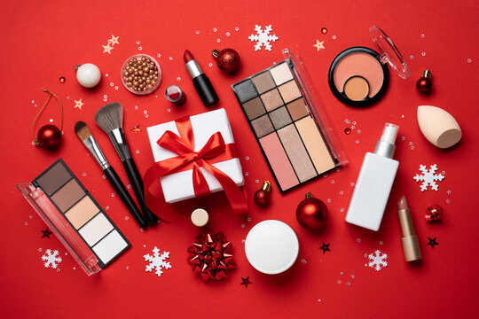 Christmas cosmetic, make-up products with holiday decorations.