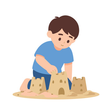 Young boy building sandcastles on a sandy beach on a sunny day