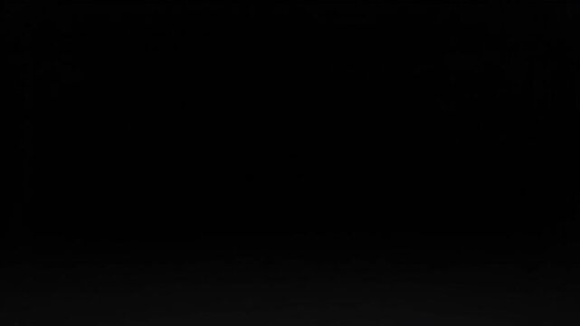 Dark empty studio stage with subtle gradient background