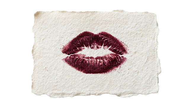 Dark burgundy lipstick kiss mark imprinted on a rough textured piece of handmade paper isolated on white on transparent background