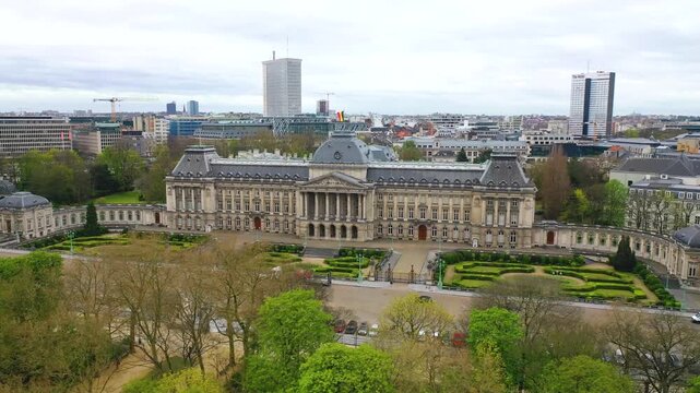 Aerial view of the Royal Palace of Brussels, Belgium, featuring its grand neoclassical facade, formal gardens and surrounding cityscape.