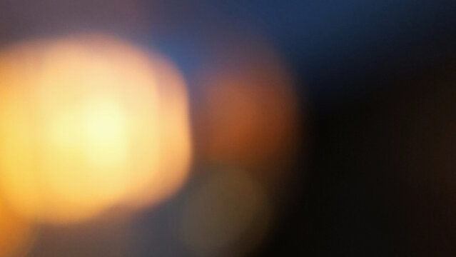 Warm bokeh light leak abstract background with soft focus blur effect for creative overlay design
