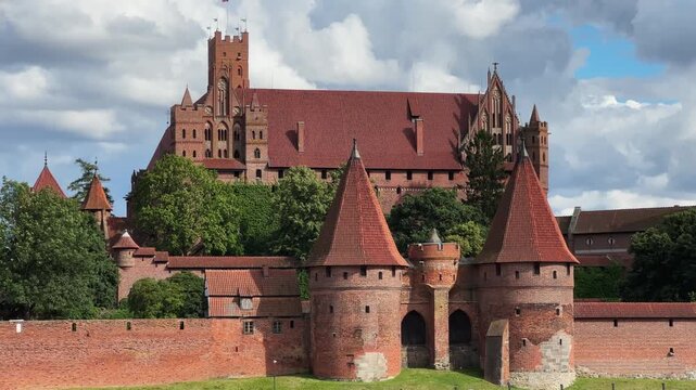 General view Malbork Castle from Nogat River opposite bank, Poland