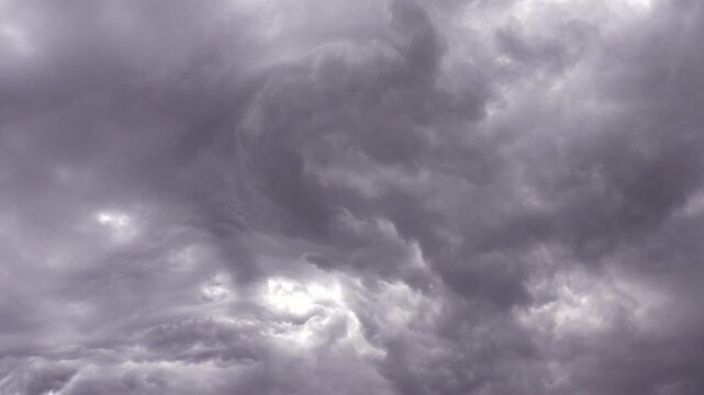 Storm cloud slowly moving across sky
