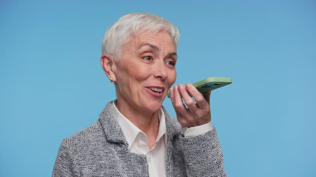Senior Woman Records Voice Message About Health Plan
