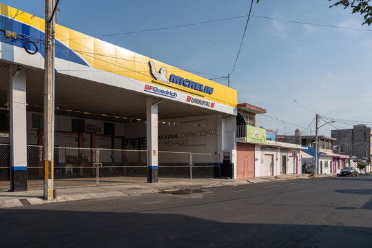 Modern Michelin tire shop facade, highlighting the Michelin tire brand logo. Commercial building with brand identity. Guadalajara, Jalisco, Mexico, May 2, 2026.