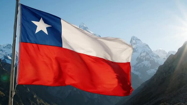 Chilean flag waving proudly against snow-capped andes mountains at sunrise national flag patriotic